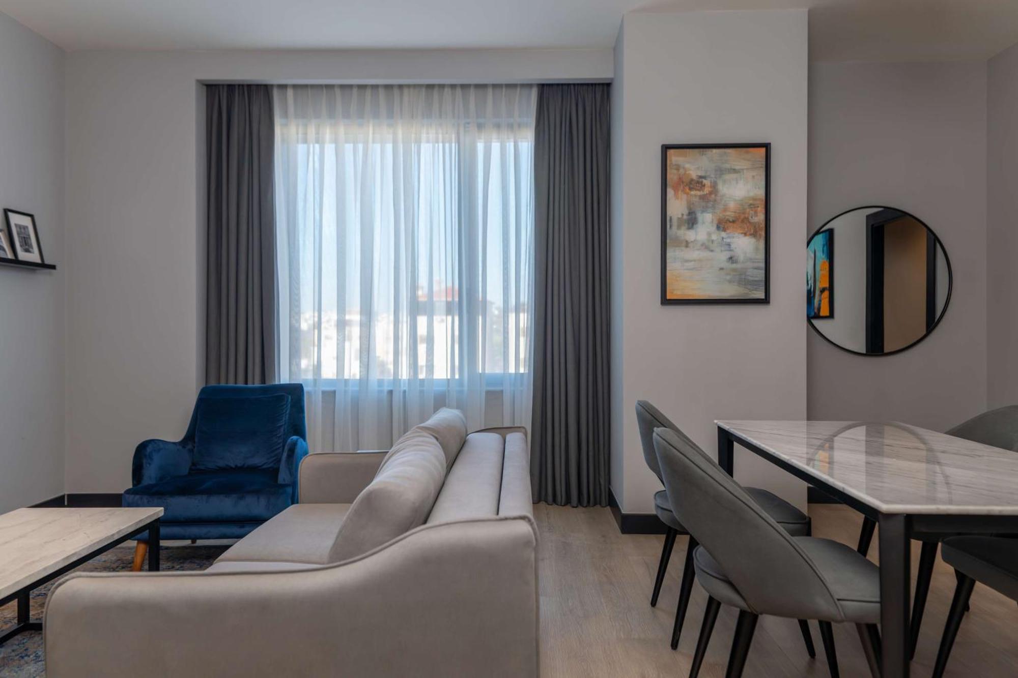 Radisson Blu Hotel, Amman Galleria Mall Exterior foto A living room